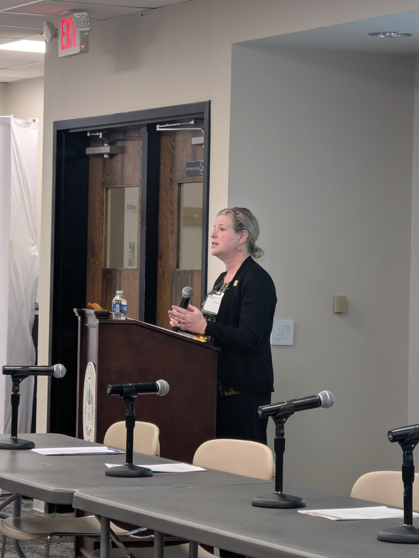 Presenter at the podium during the Trenton urban ag and sustainability meeting